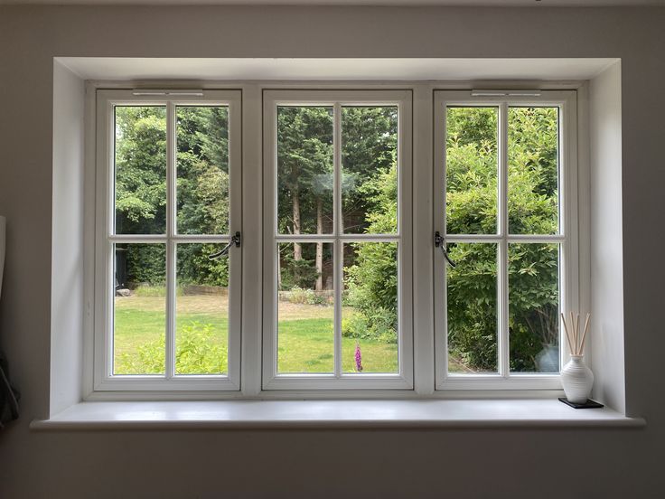 Triple pane casement windows with garden view - 1st Capital Certified Roofing Austin TX