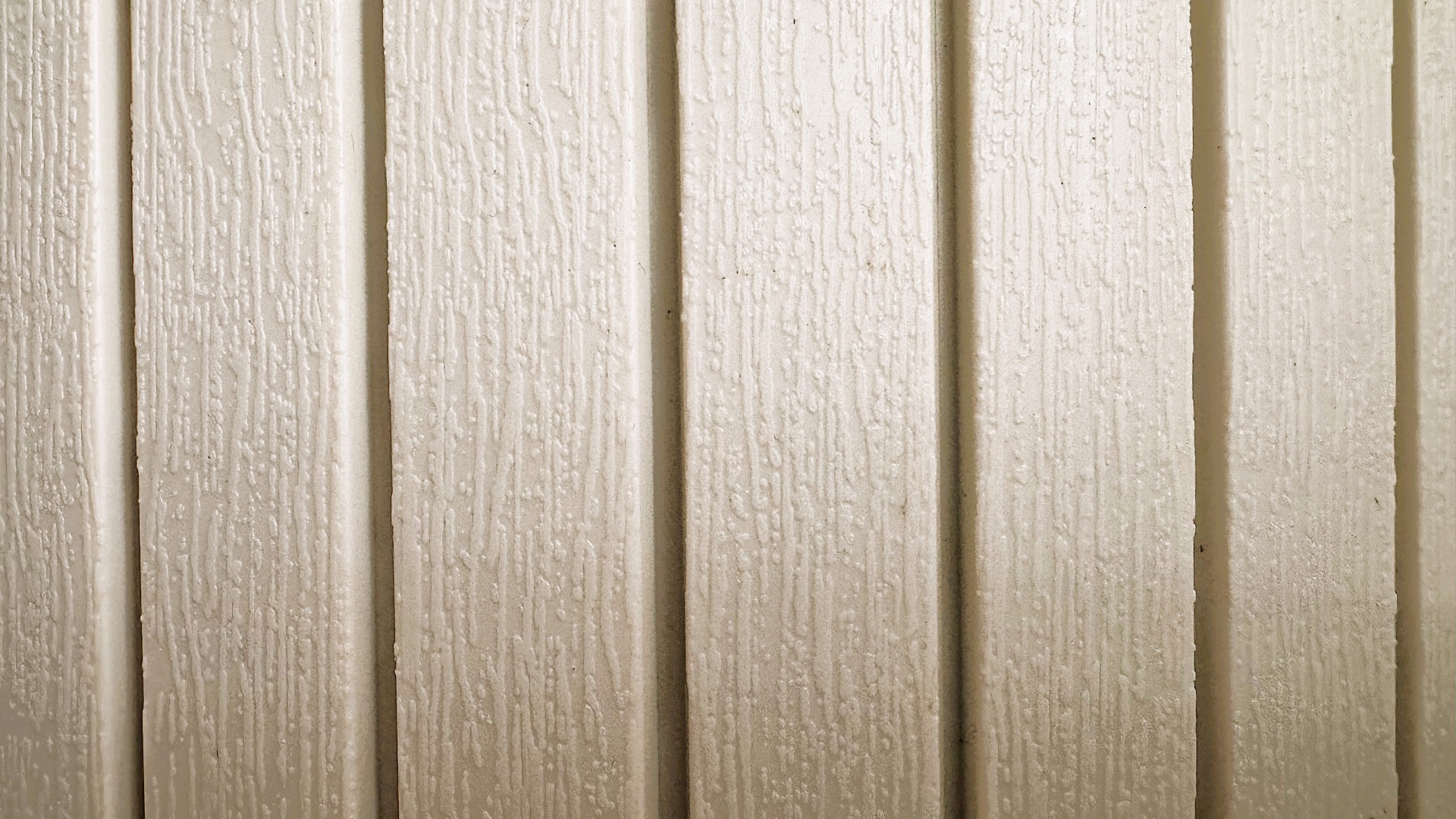 Natural wood board and batten siding panels - 1st Capital Certified Roofing Austin TX