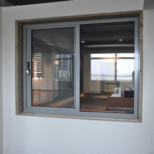 Grey aluminium frame sliding window - 1st Capital Certified Roofing Austin TX